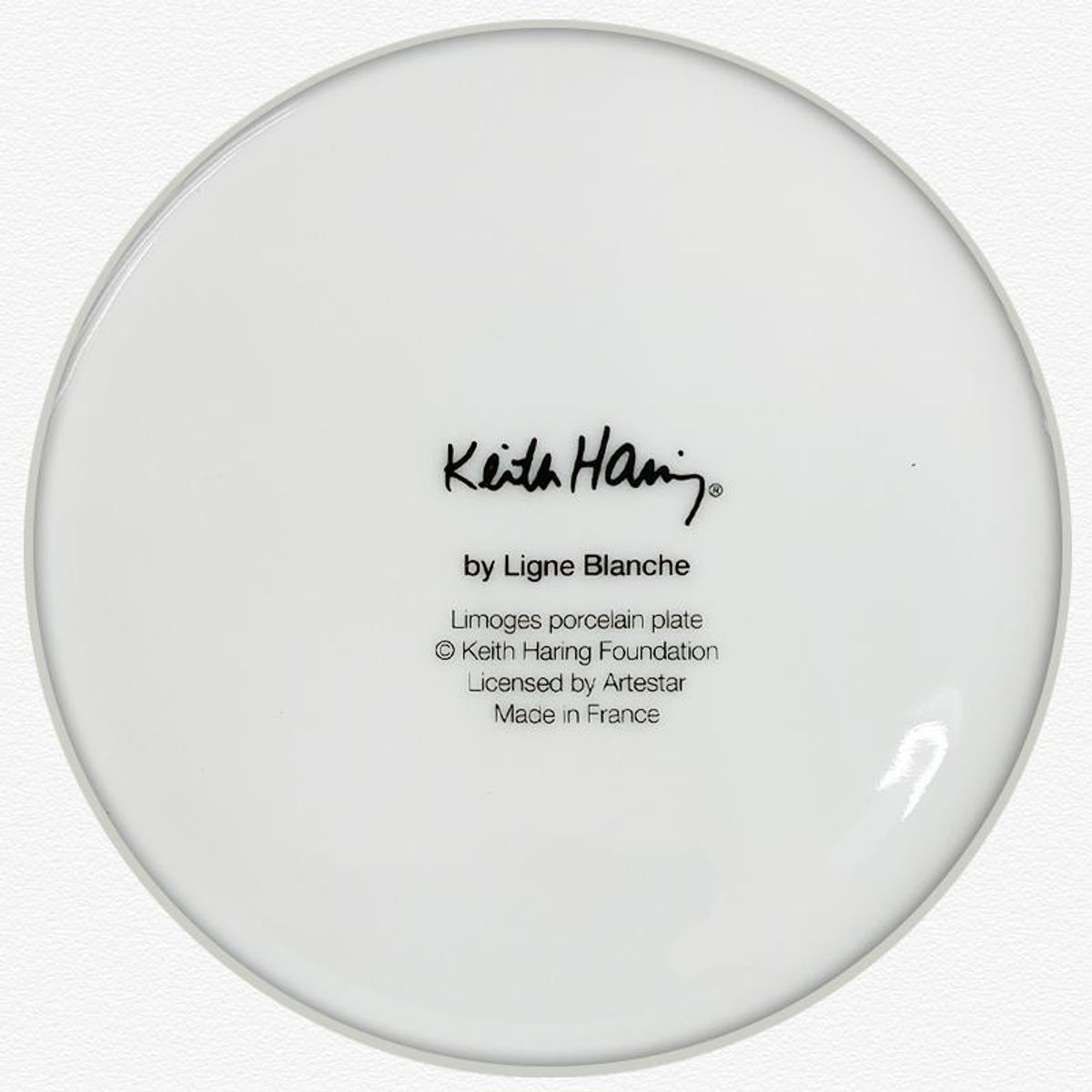 Keith Haring (1958-1990), "Enfant" Framed Limoges Porcelain Plate.
