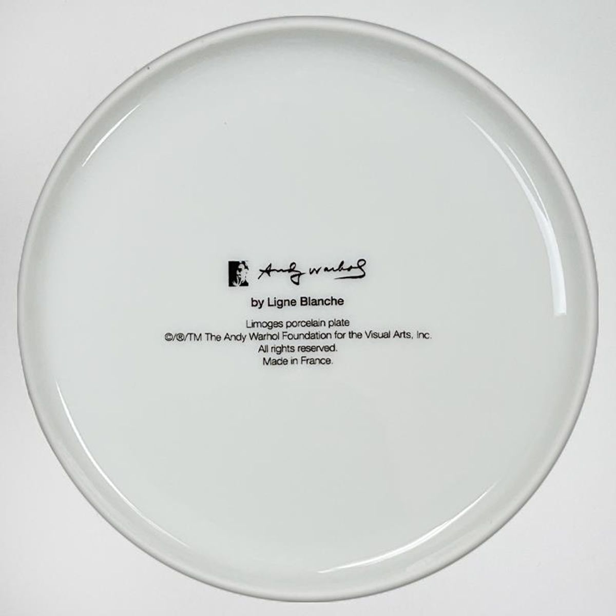 Andy Warhol (1928-1987), "White Flower" Framed Limoges Porcelain Plate.