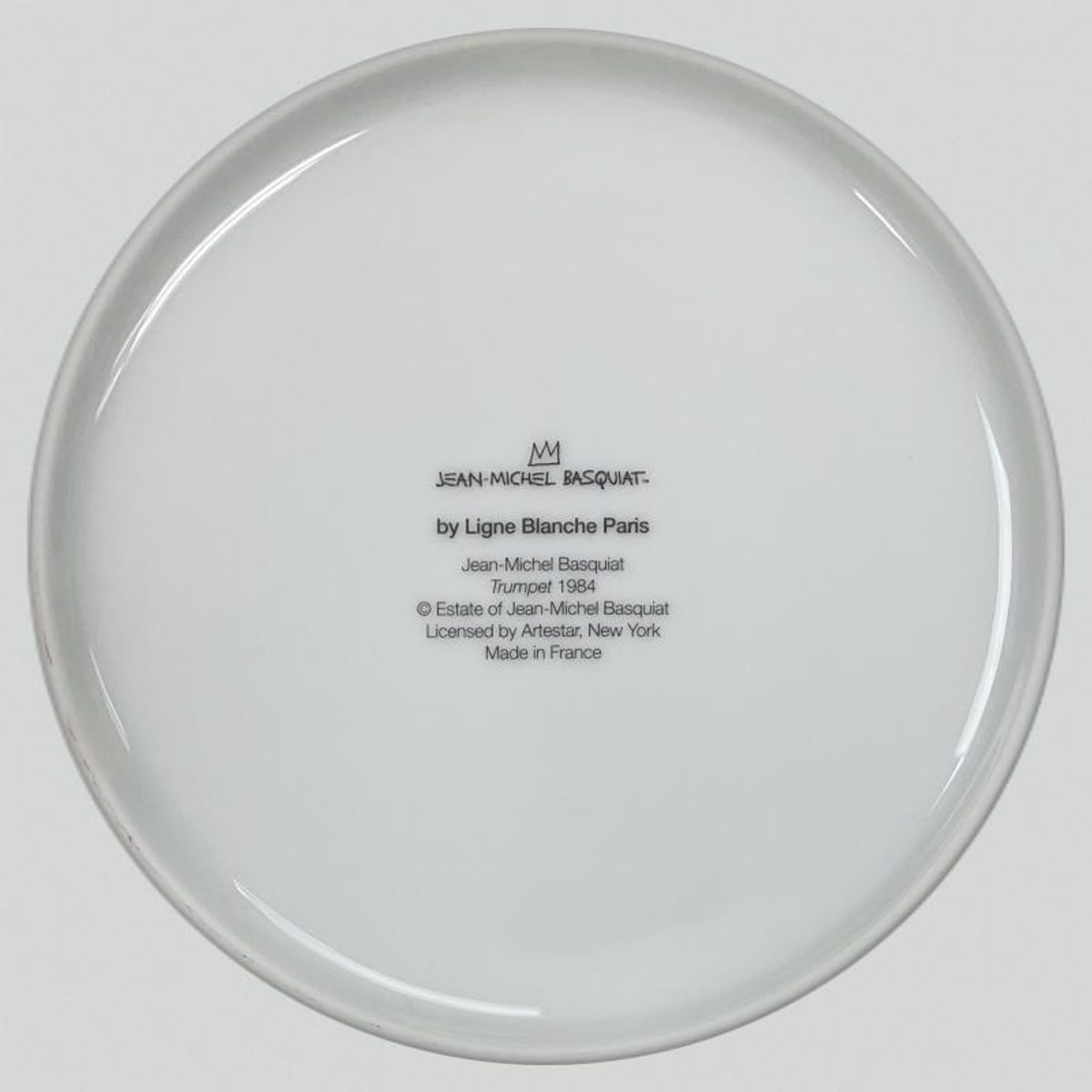 Jean-Michel Basquiat (1960-1988), "Trumpet 1984" Framed Limoges Porcelain Plate.