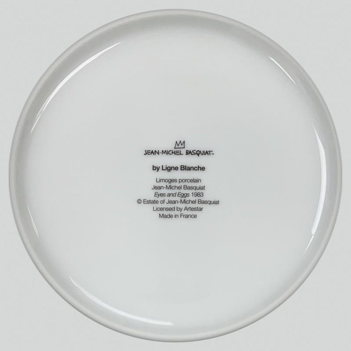 Jean-Michel Basquiat (1960-1988), "Eyes and Eggs 1983" Framed Limoges Porcelain Plate.