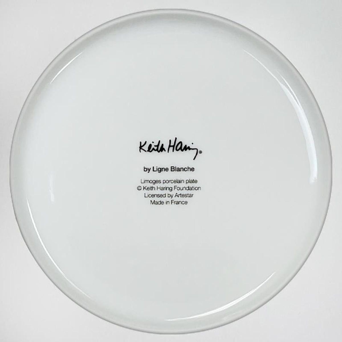 Keith Haring (1958-1990), "Red on White" Framed Limoges Porcelain Plate.
