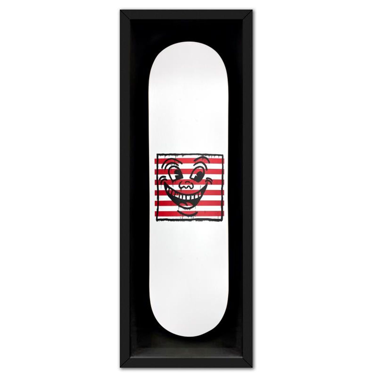 Keith Haring (1958-1990), "Untitled (Smile On Stripes)" Framed Skateboard, Plate Signed with Letter of Authenticity.