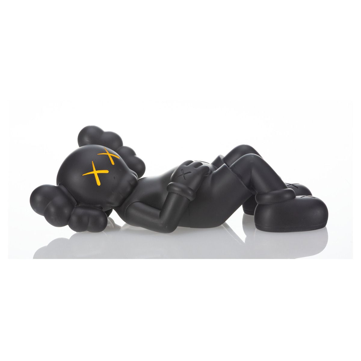 KAWS (b. 1974)- Painted cast vinyl "Holiday: Japan"