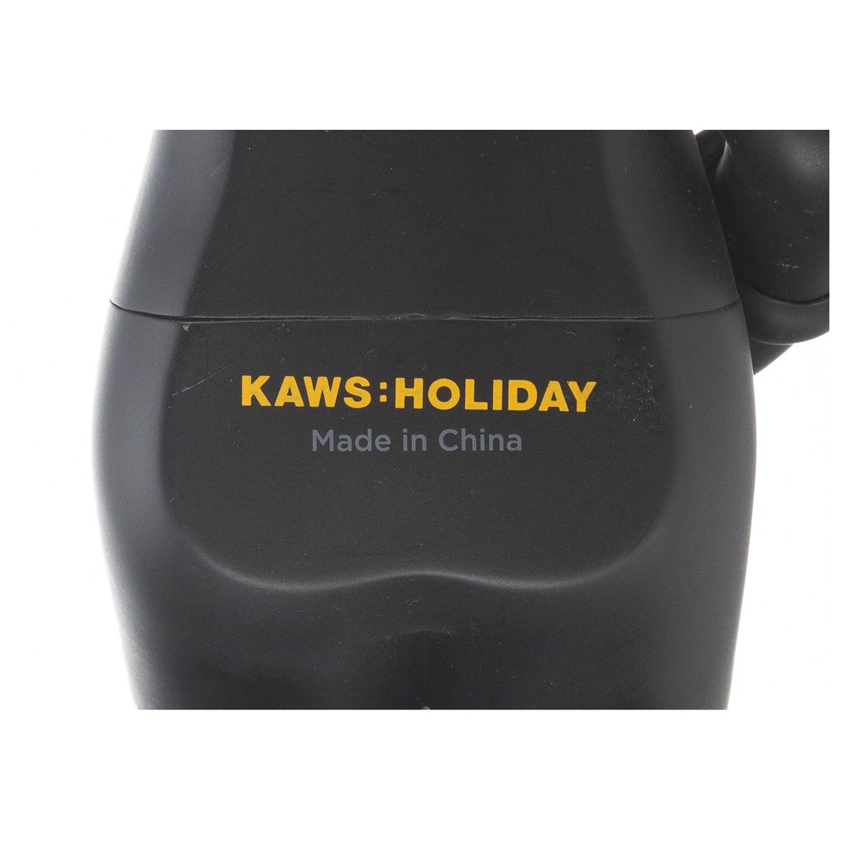 KAWS (b. 1974)- Painted cast vinyl "Holiday: Japan"